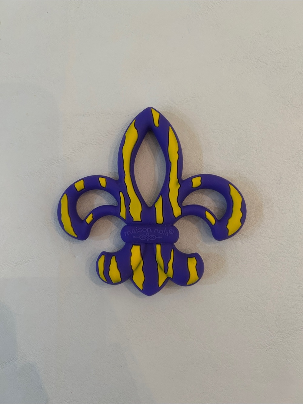 Maison Nola Fleur-de-Lis Wall Teether in Purple and Yellow